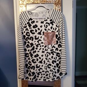 Trendy Boutique Black and White Leopard Print Top with Gold Pocket